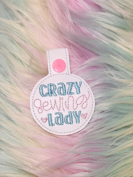 Crazy Sewing Lady Snap Tab